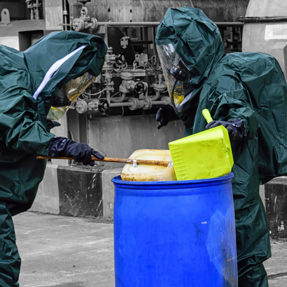 Hazardous clean up with mariners in hazmat suits