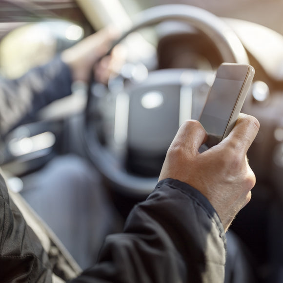 The Dangers of Cell Phone Use While Driving: Developing Safe Practices & Corporate Guidelines