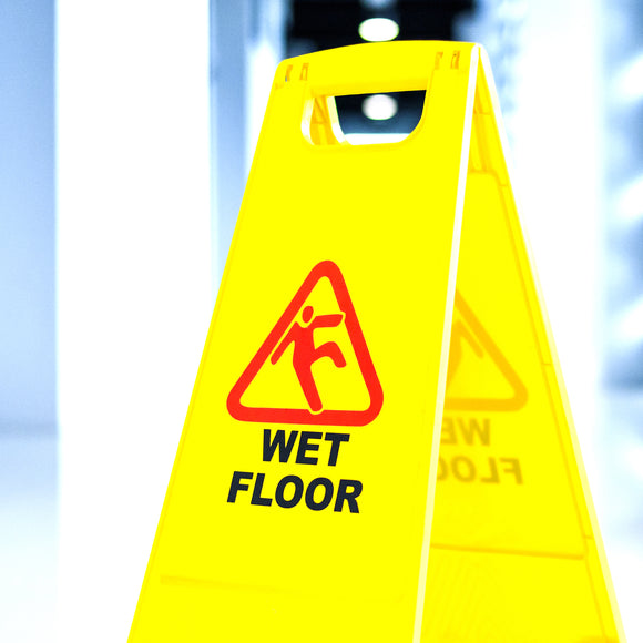 wet floor sign in a maritime galley